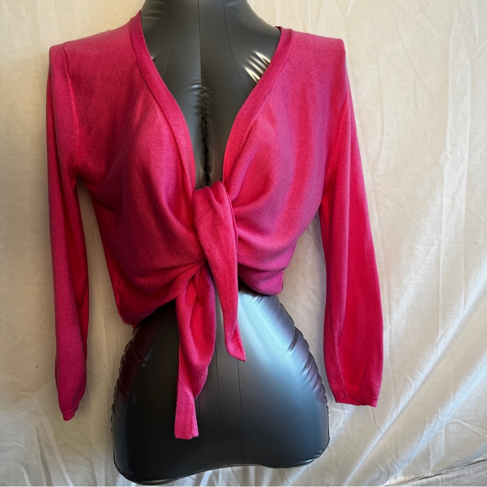 Ann Taylor Pink shrug, ties up front. Size is medium.
